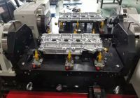 平衡軸蓋四軸夾具